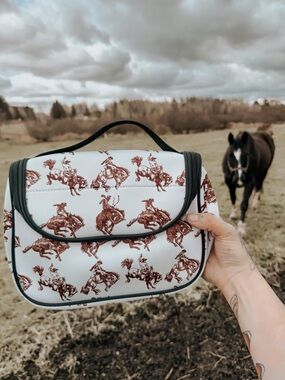 Cowboy Print Cosmetic Bag — Cream with Maroon Rodeo Motif